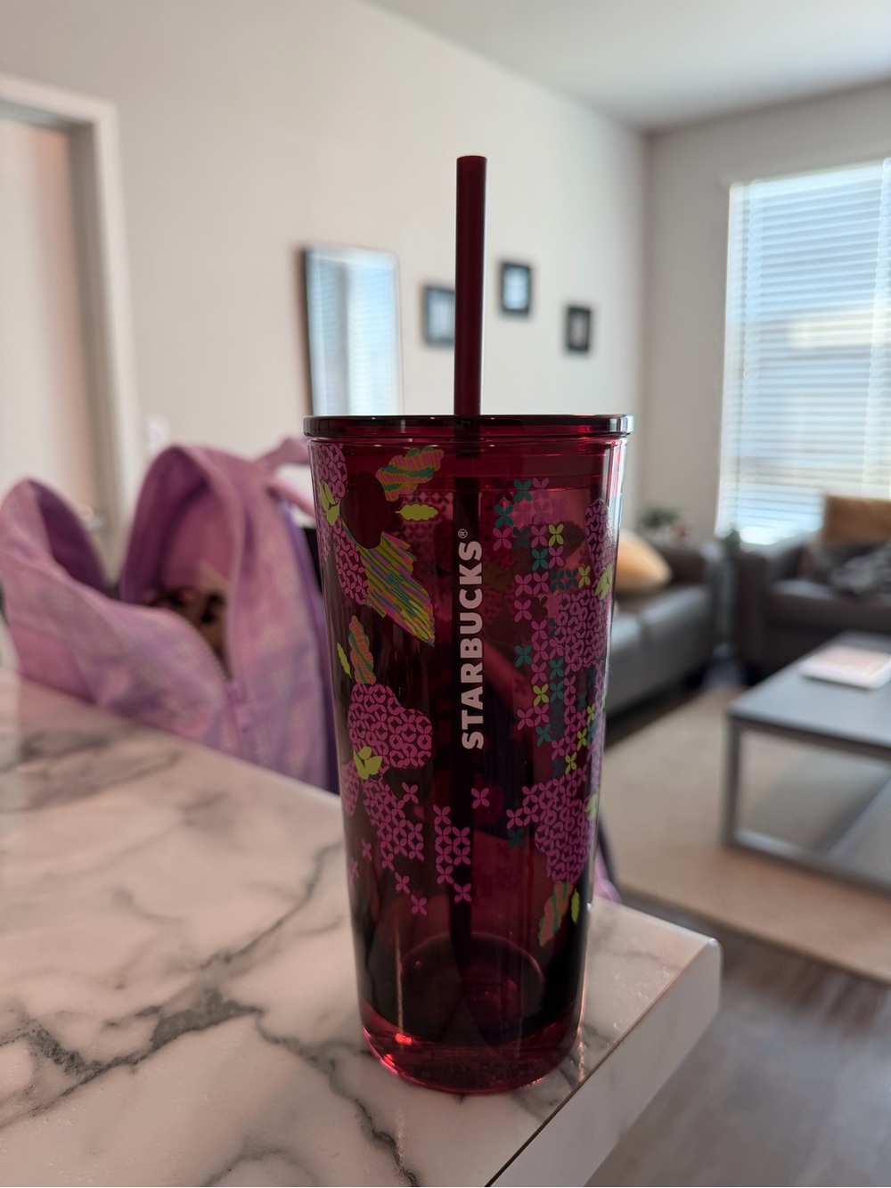 Starbucks glass cup with straw